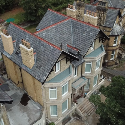 A roof re-covered using second hand Welsh Slates