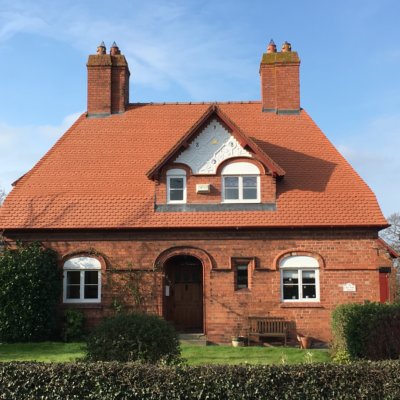 A newly tiled roof on the outskirts of Chester featuring bespoke tiles
