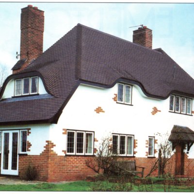 A tiled roof in Woore featuring 'Eyebrow Dormers'