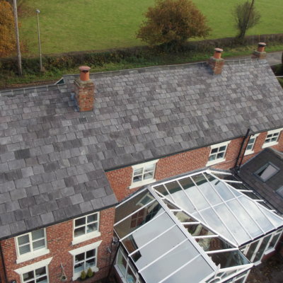 A re-roofed property in Little Leigh featuring reclaimed random slates