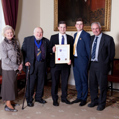 William, pictured with the Emerton family, receiving his Mason Elliot Award in London from the Worshipful Company of Tylers and Bricklayers.